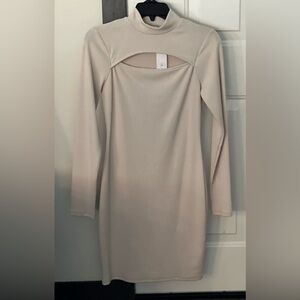 Beige cream cut out dress NWT women’s size M .